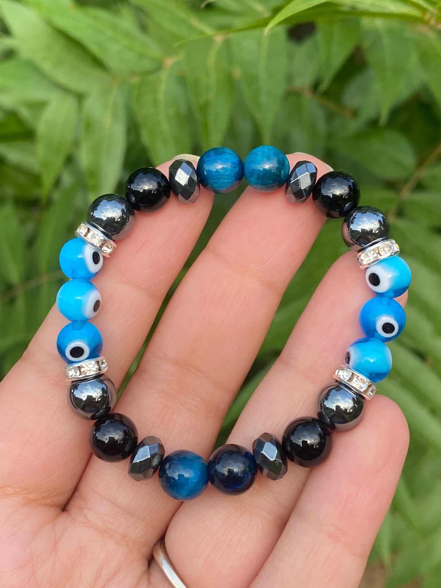 Hematite, black onyx, blue tigers eye, evil eye