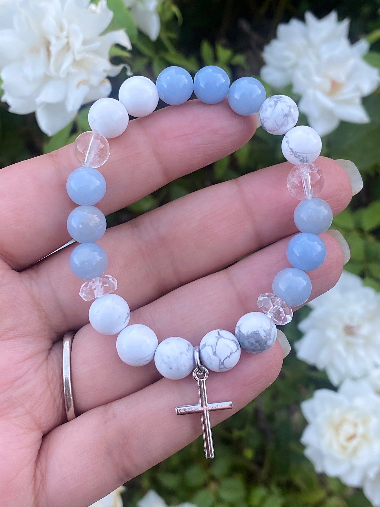 Howlite, angelite, and clear quartz with silver cross charm