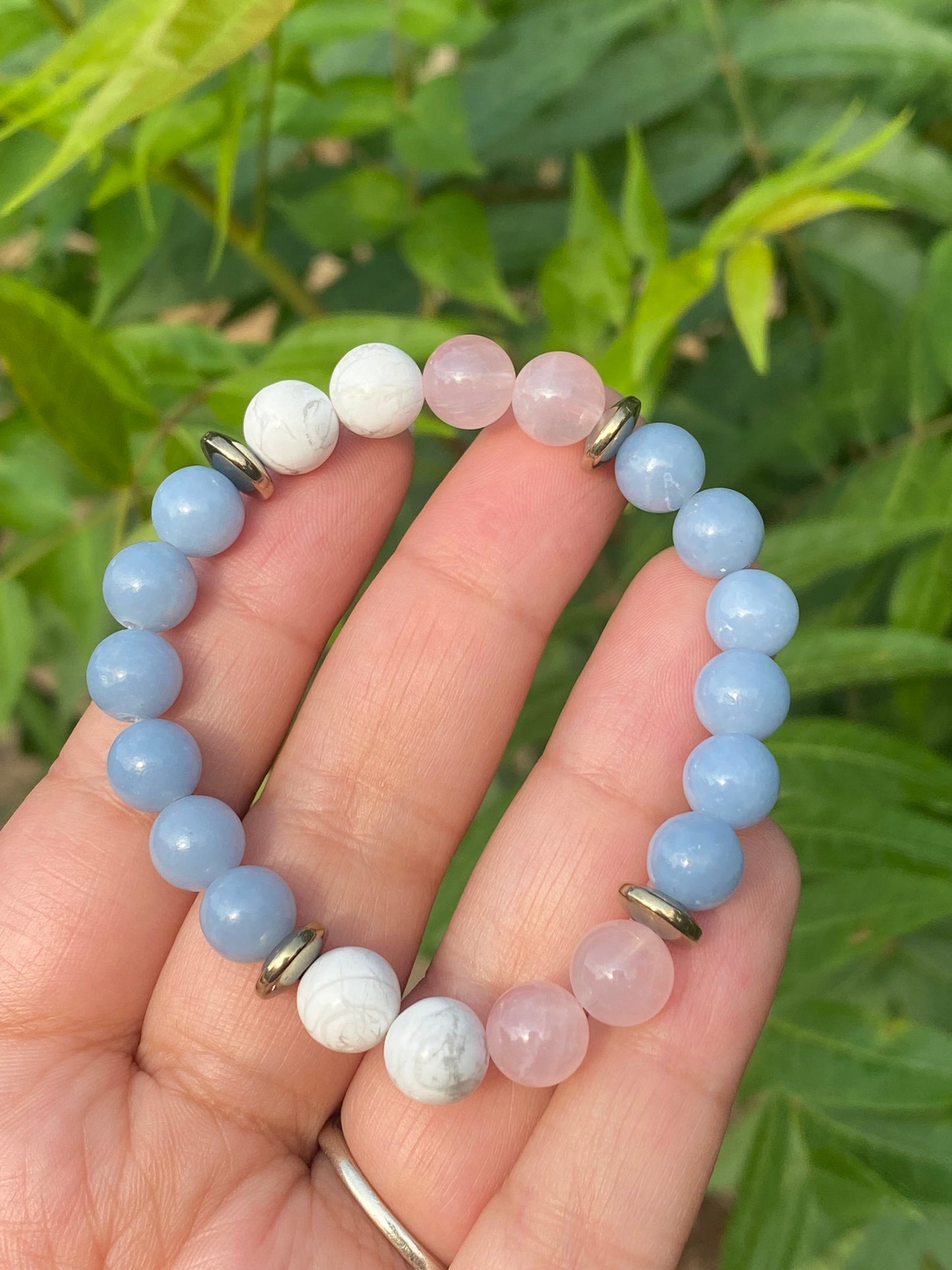 Angelite, pyrite, rose quartz, and howlite