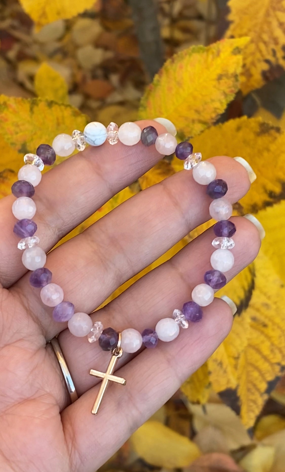 Amethyst, rose quartz, clear quartz, and howlite with cross charm