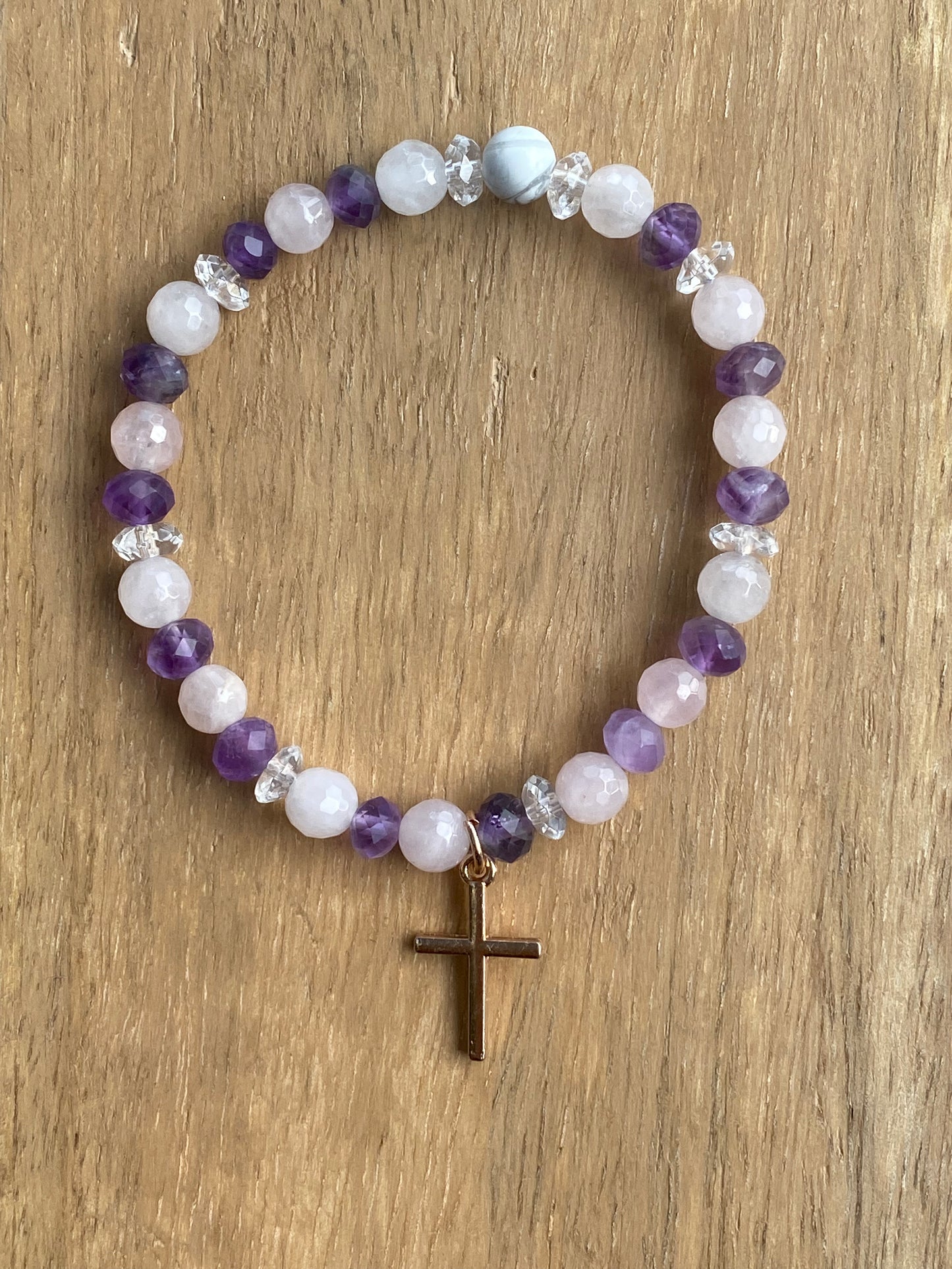 Amethyst, rose quartz, clear quartz, and howlite with cross charm