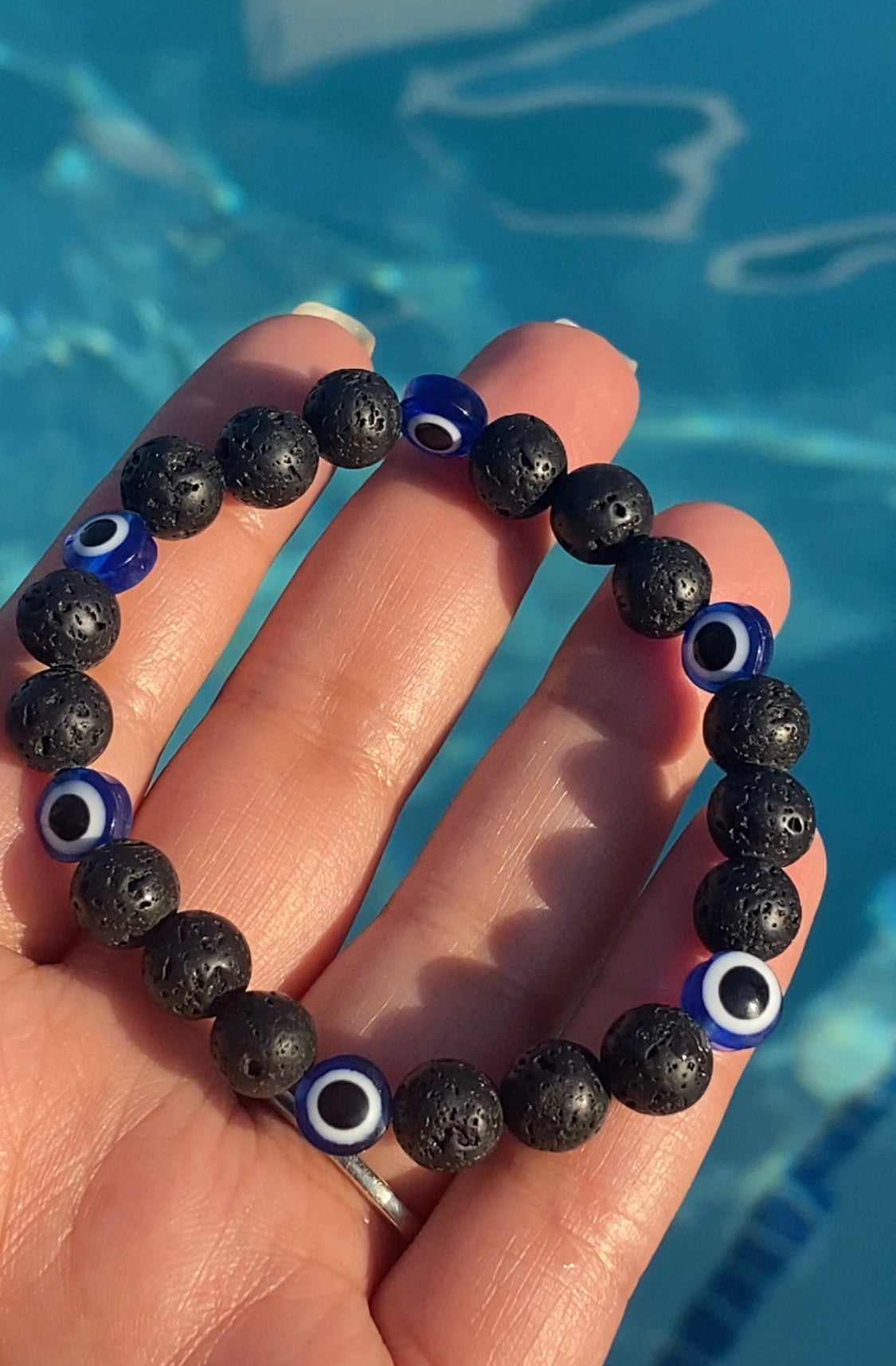 Evil eye with lava stones