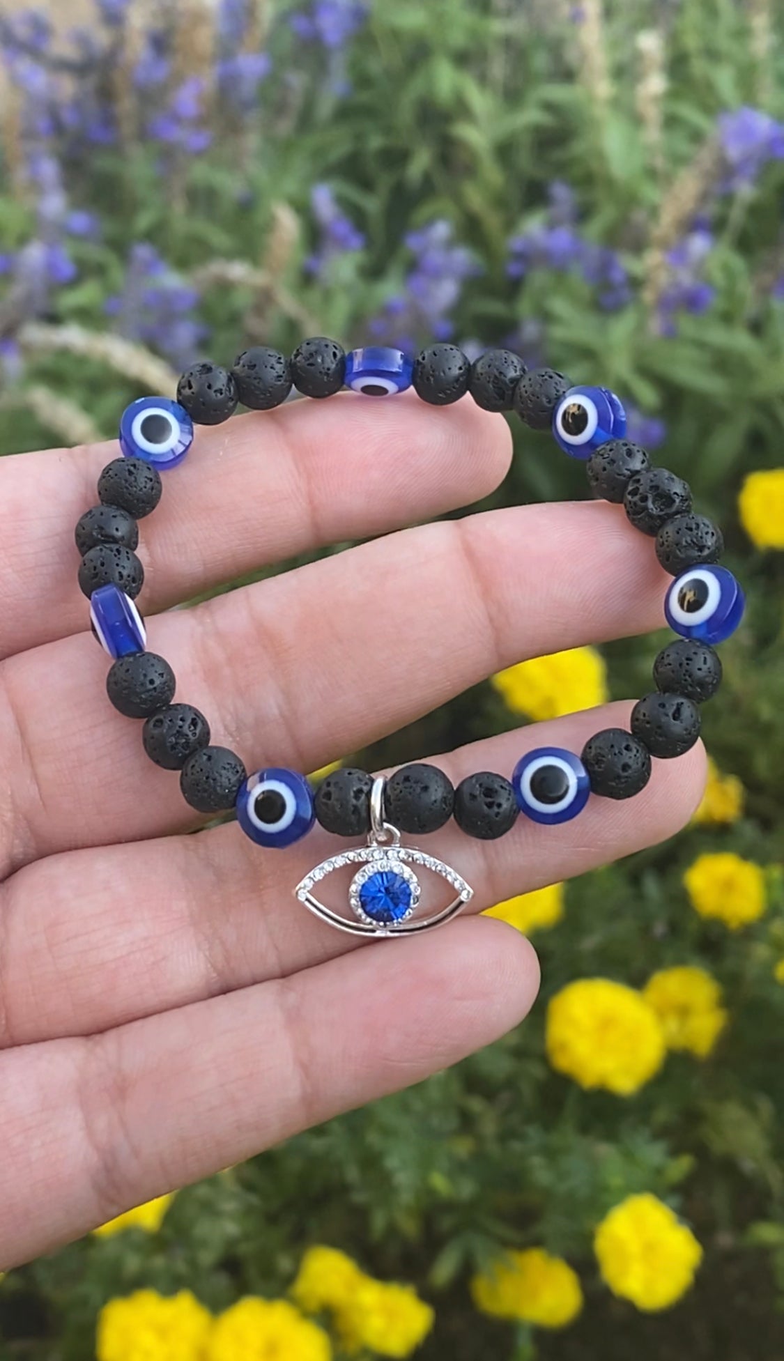 Evil eye with charm